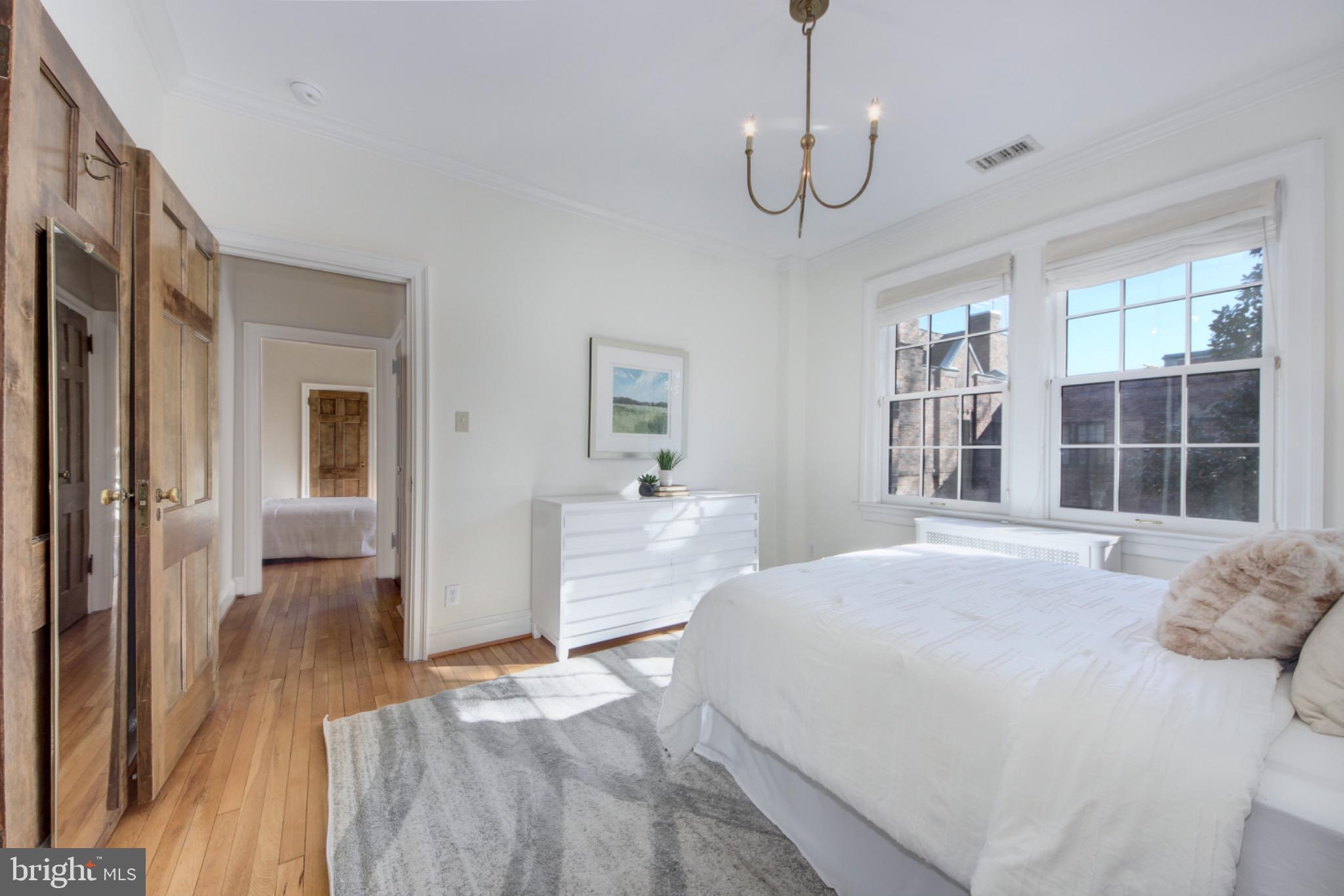 3000 Tilden Street Northwest, Unit 501I Washington, DC 20008 - Photo 24 of 48 a bedroom with a large bed and a window