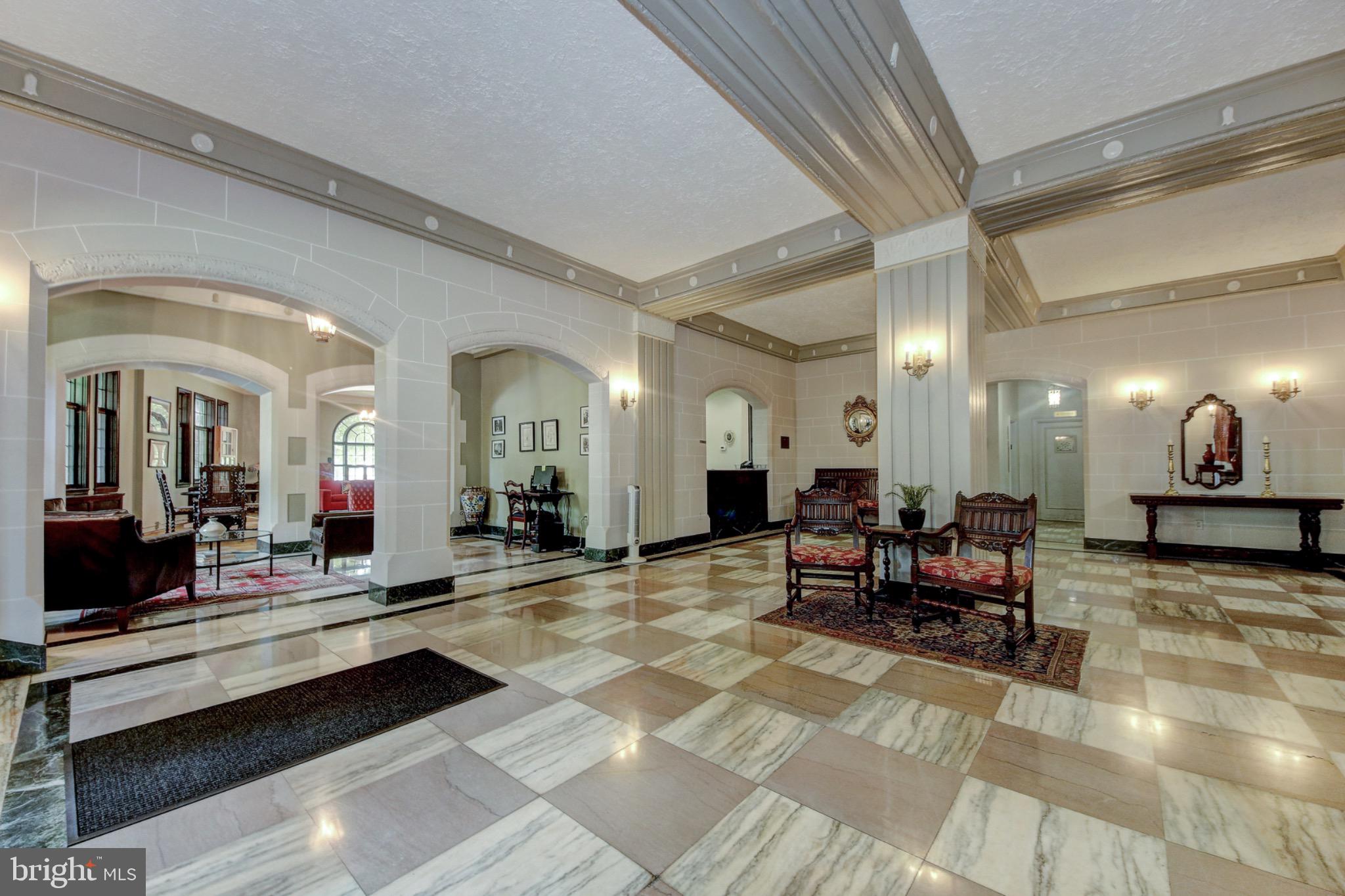3000 Tilden Street Northwest, Unit 501I Washington, DC 20008 - Photo 31 of 48 a lobby with furniture and a large window