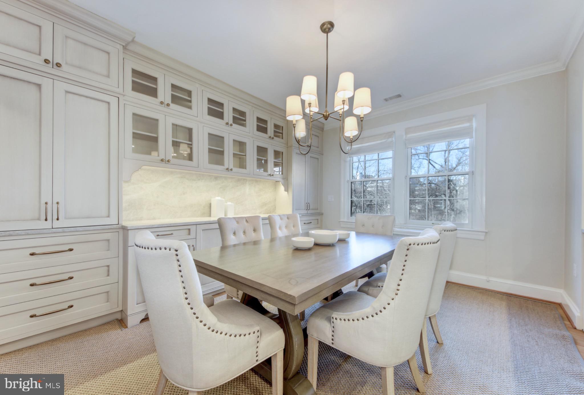 3000 Tilden Street Northwest, Unit 501I Washington, DC 20008 - Photo 8 of 48 a view of a dining room with furniture window and wooden floor