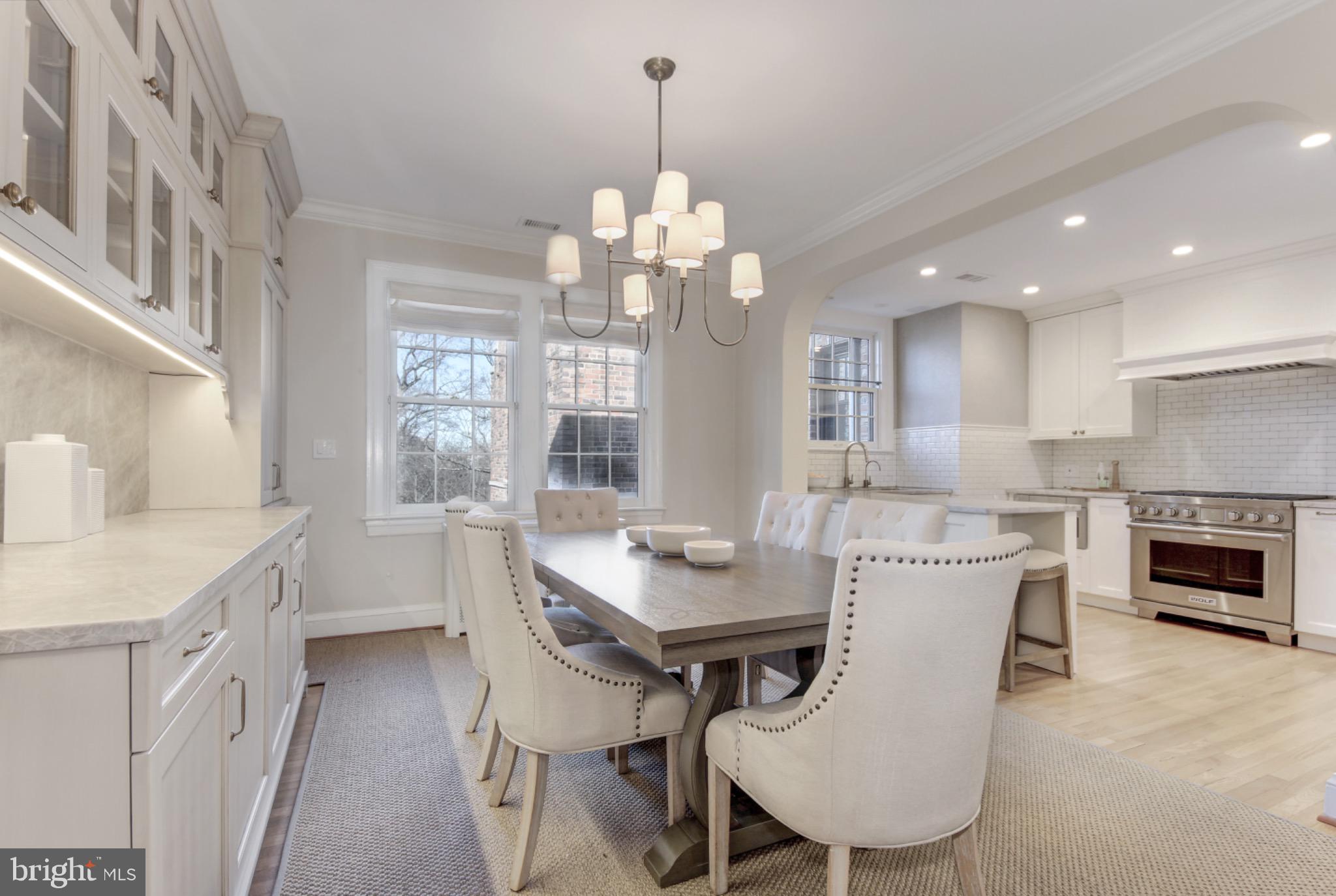 3000 Tilden Street Northwest, Unit 501I Washington, DC 20008 - Photo 10 of 48 a view of a dining room with furniture window and wooden floor