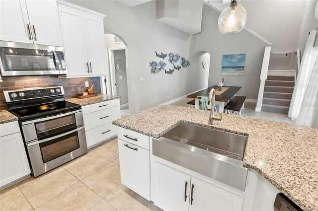 a bed room with a bed and a window