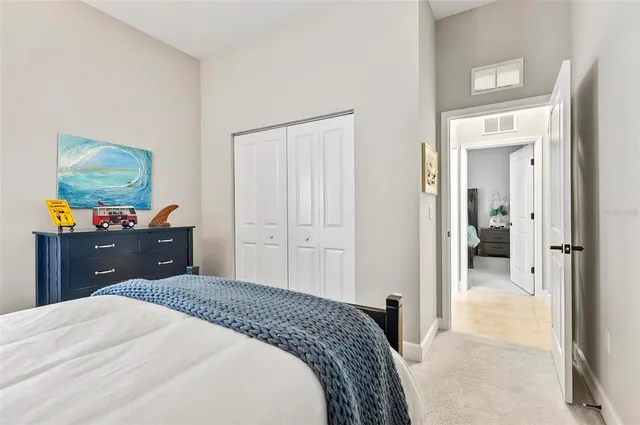 an aerial view of residential houses with outdoor space and swimming pool
