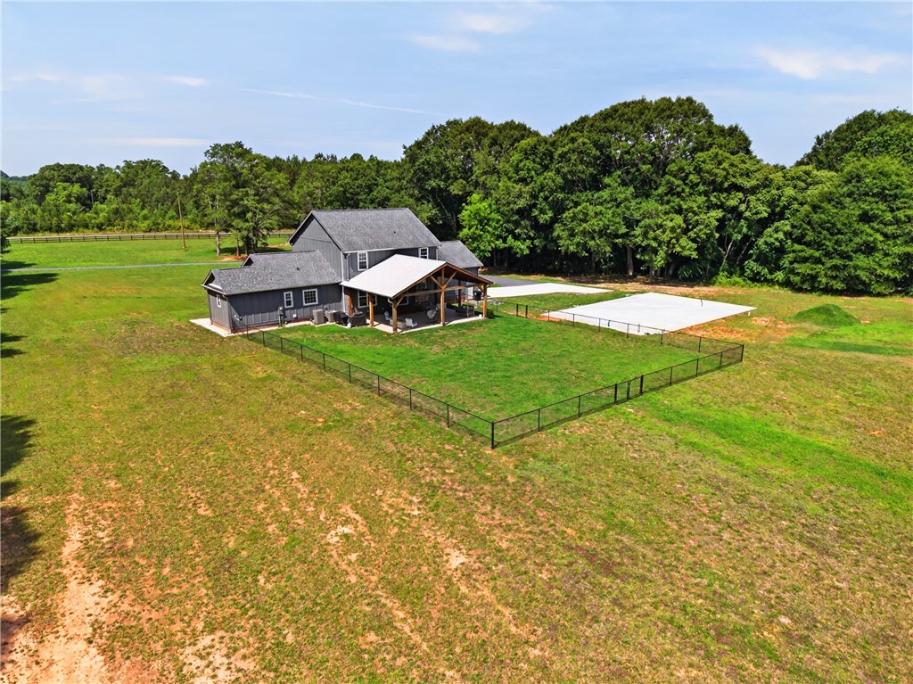 5016 Copeland Road Belton, SC 29627 - Photo 42 of 45 A spacious yard with a covered patio creates an ideal setting for outdoor living.