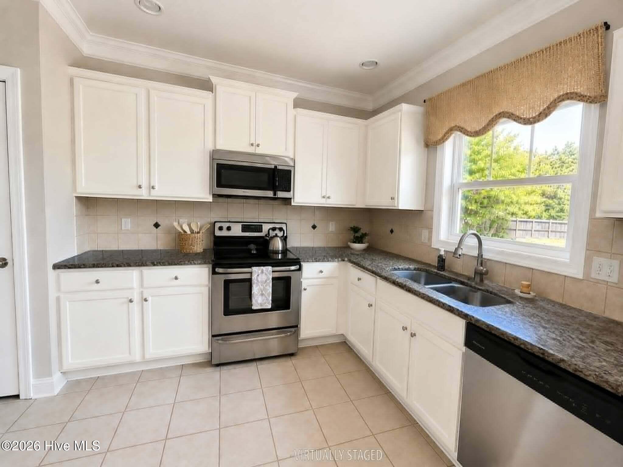 673 Morris Landing Road Holly Ridge, NC 28445 - Photo 33 of 125 Virtually staged kitchen