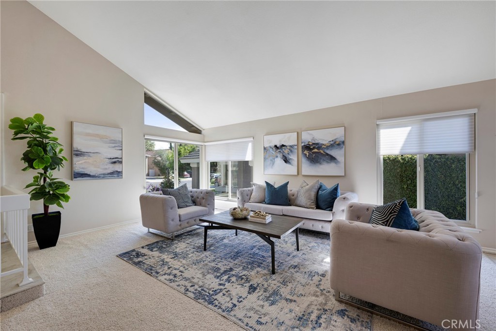 19 Ninos Irvine, CA 92620 - Photo 1 of 65 a living room with furniture and a large window