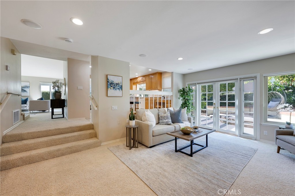 19 Ninos Irvine, CA 92620 - Photo 4 of 65 a living room with furniture and a large window