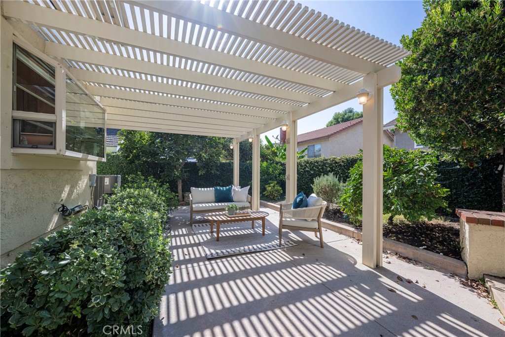 19 Ninos Irvine, CA 92620 - Photo 46 of 65 a view of a patio with wooden floor