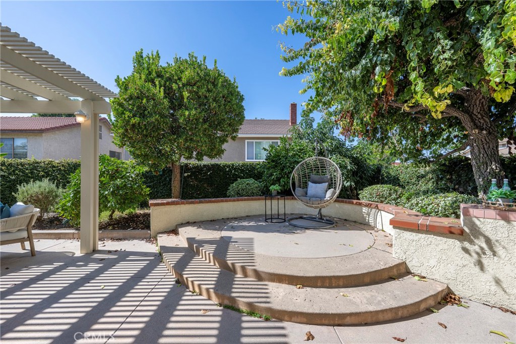 19 Ninos Irvine, CA 92620 - Photo 50 of 65 a view of a house with backyard porch and sitting area