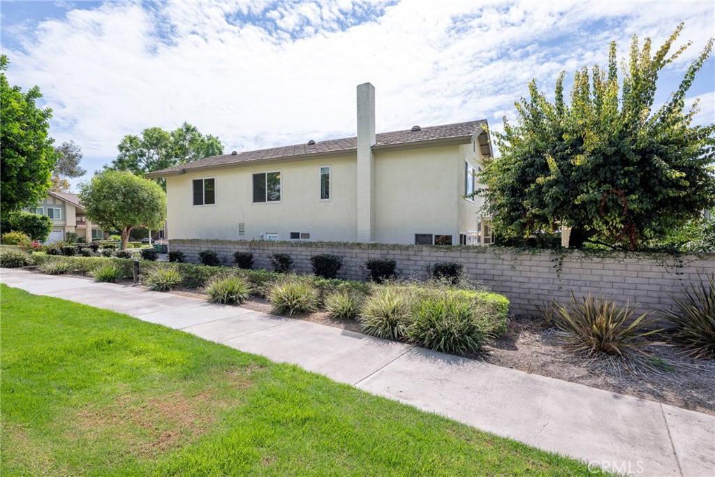 19 Ninos Irvine, CA 92620 - Photo 54 of 65 a front view of a house with garden