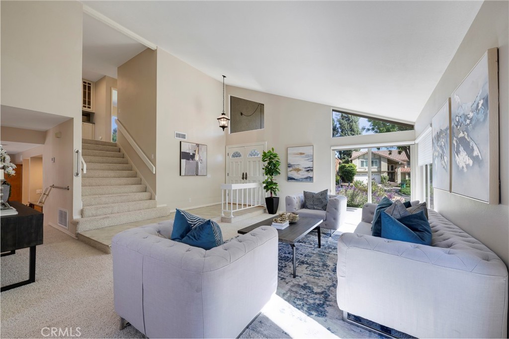 19 Ninos Irvine, CA 92620 - Photo 10 of 65 a living room with furniture and a large window