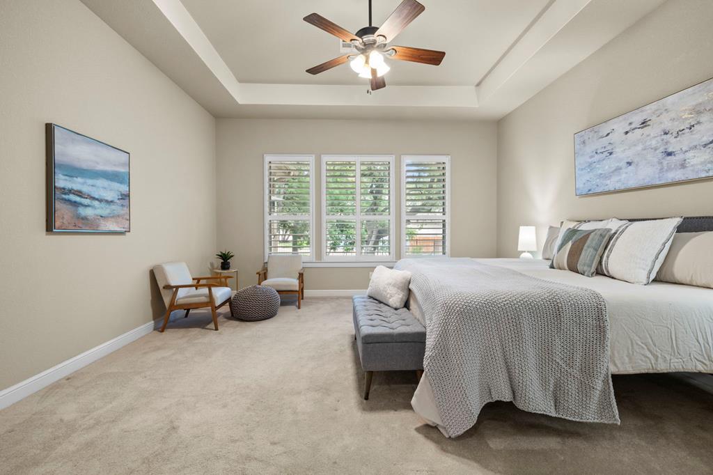 210 Mickelson Lane Georgetown, TX 78628 - Photo 20 of 39 a bedroom with furniture and large windows