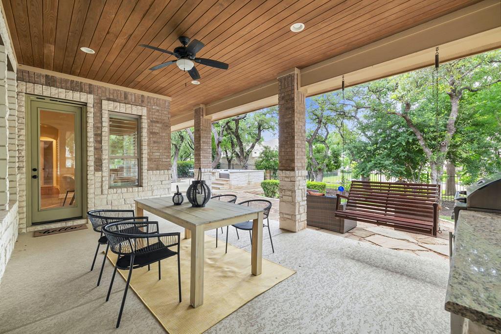 210 Mickelson Lane Georgetown, TX 78628 - Photo 27 of 39 a view of a patio with a table and chairs