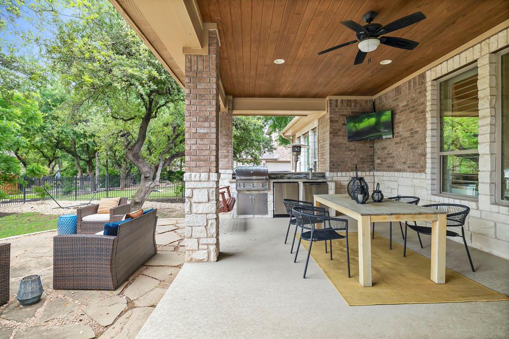 210 Mickelson Lane Georgetown, TX 78628 - Photo 28 of 39 a view of a patio with couches table and chairs