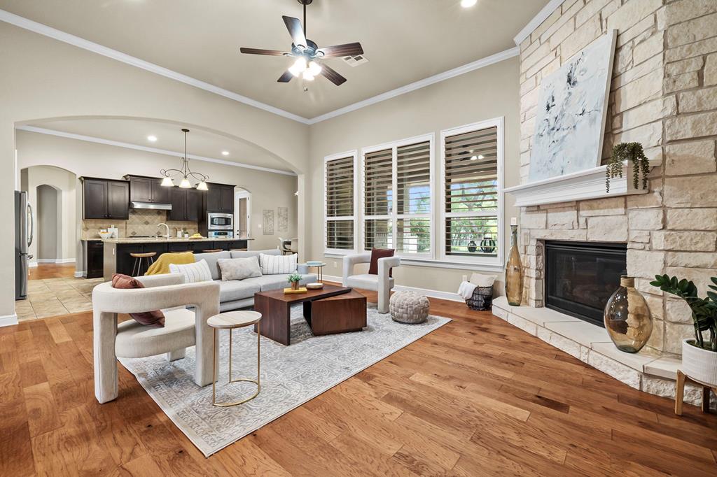 210 Mickelson Lane Georgetown, TX 78628 - Photo 3 of 39 a living room with furniture fireplace and window