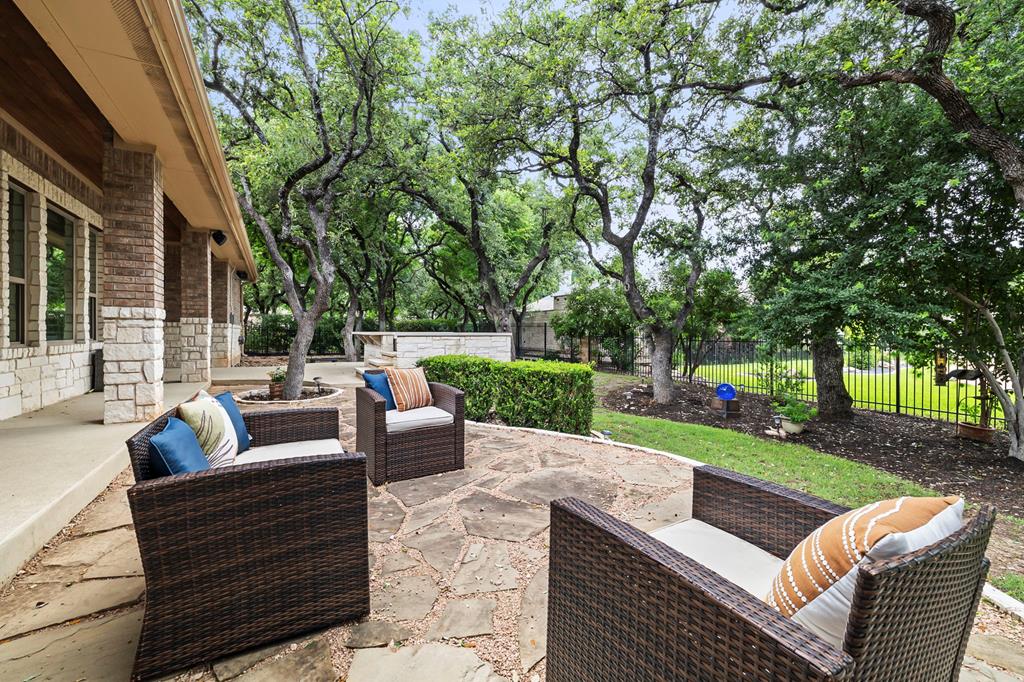 210 Mickelson Lane Georgetown, TX 78628 - Photo 36 of 39 a view of a patio with couches and a big yard