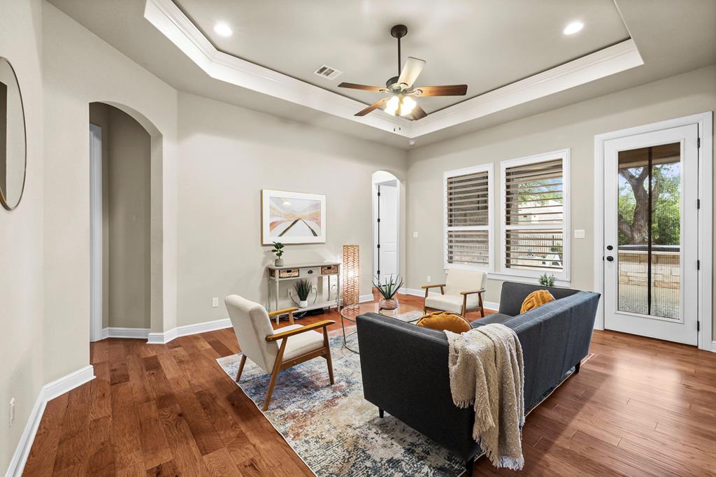 210 Mickelson Lane Georgetown, TX 78628 - Photo 7 of 39 a living room with furniture and a large window