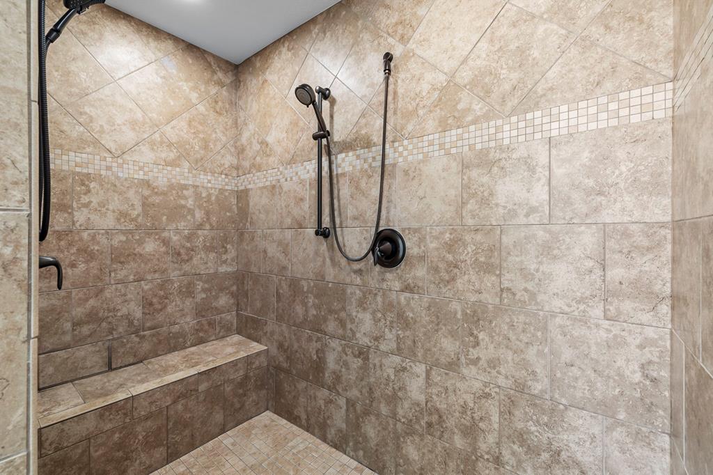 210 Mickelson Lane Georgetown, TX 78628 - Photo 9 of 39 a bathroom with a shower