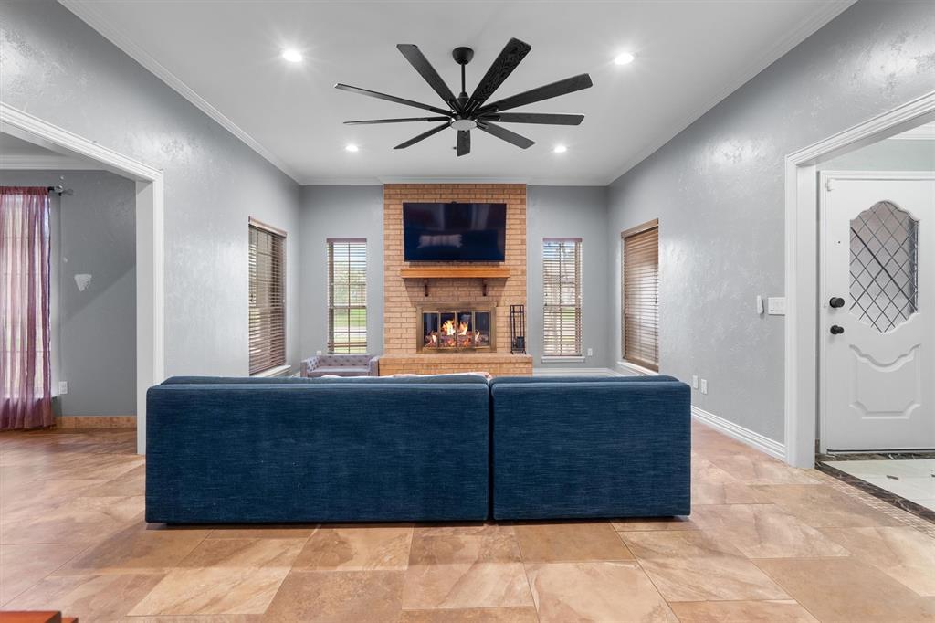 2214 Valley Mill Carrollton, TX 75006 - Photo 6 of 36 a living room with a bed furniture and a window