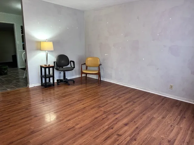 a workspace with wooden floor