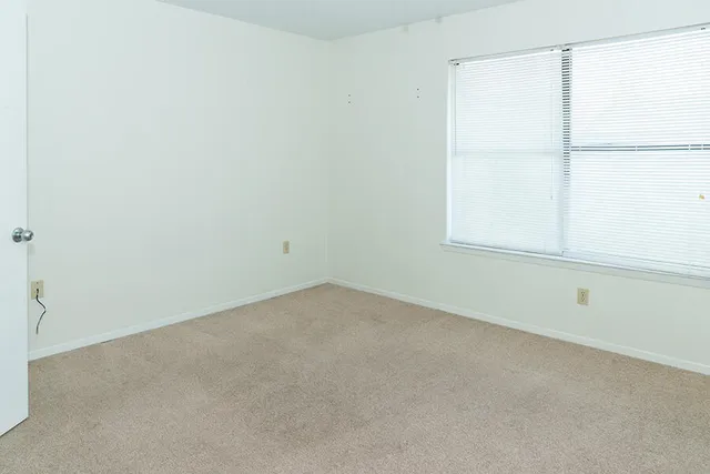 an empty room with a window