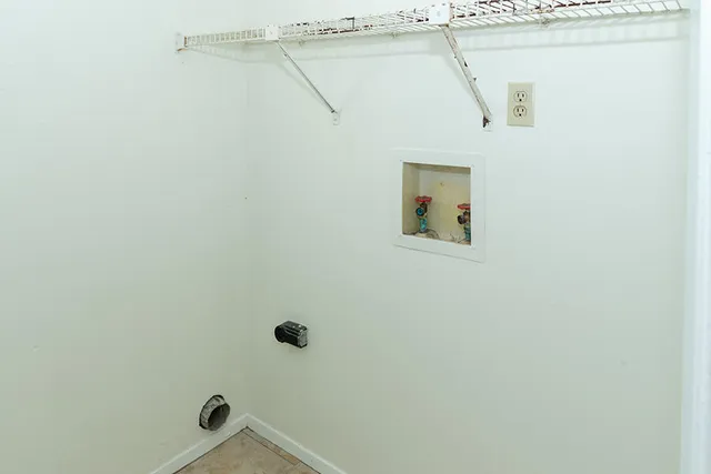 a view of a room with racks on the wall