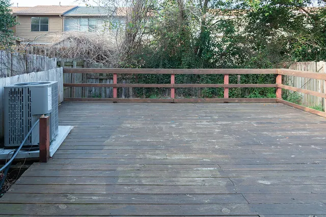 a view of backyard with green space