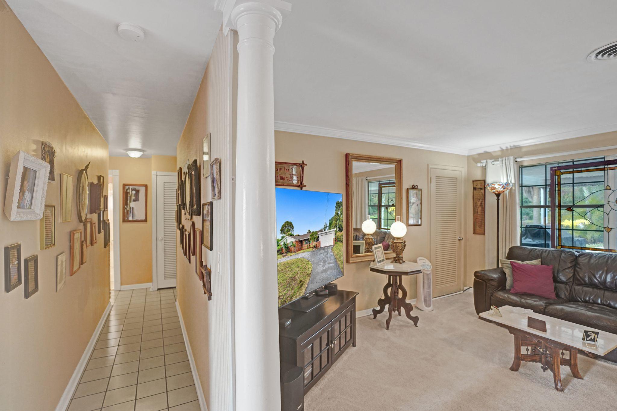 6947 High Ridge Road Lake Worth, FL 33462 - Photo 17 of 45 Hallway/Family Room!