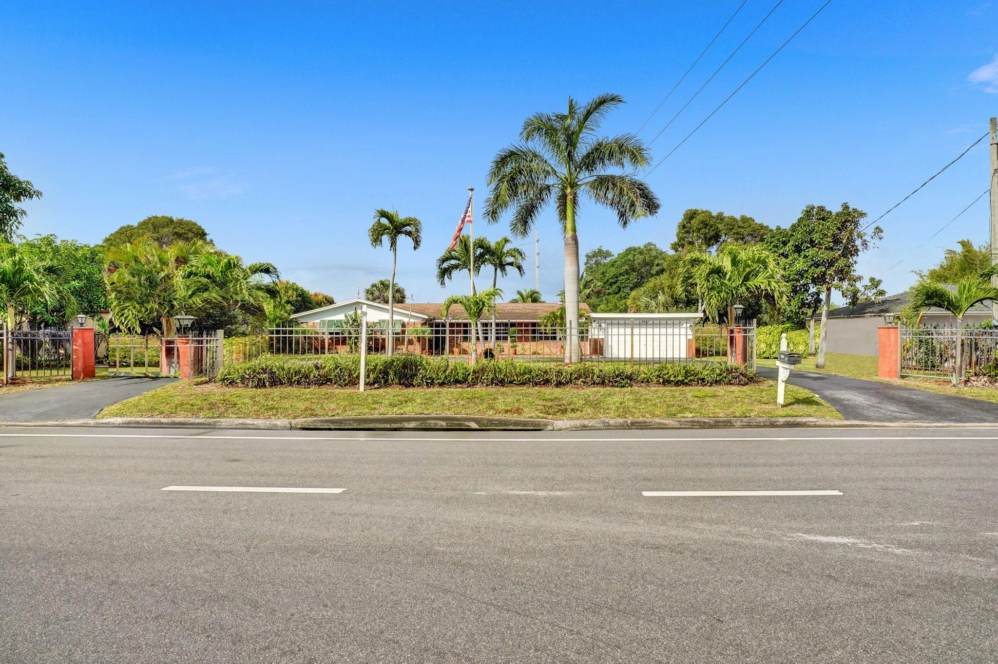 6947 High Ridge Road Lake Worth, FL 33462 - Photo 41 of 45 Fenced Yard/ Huge Driveway!