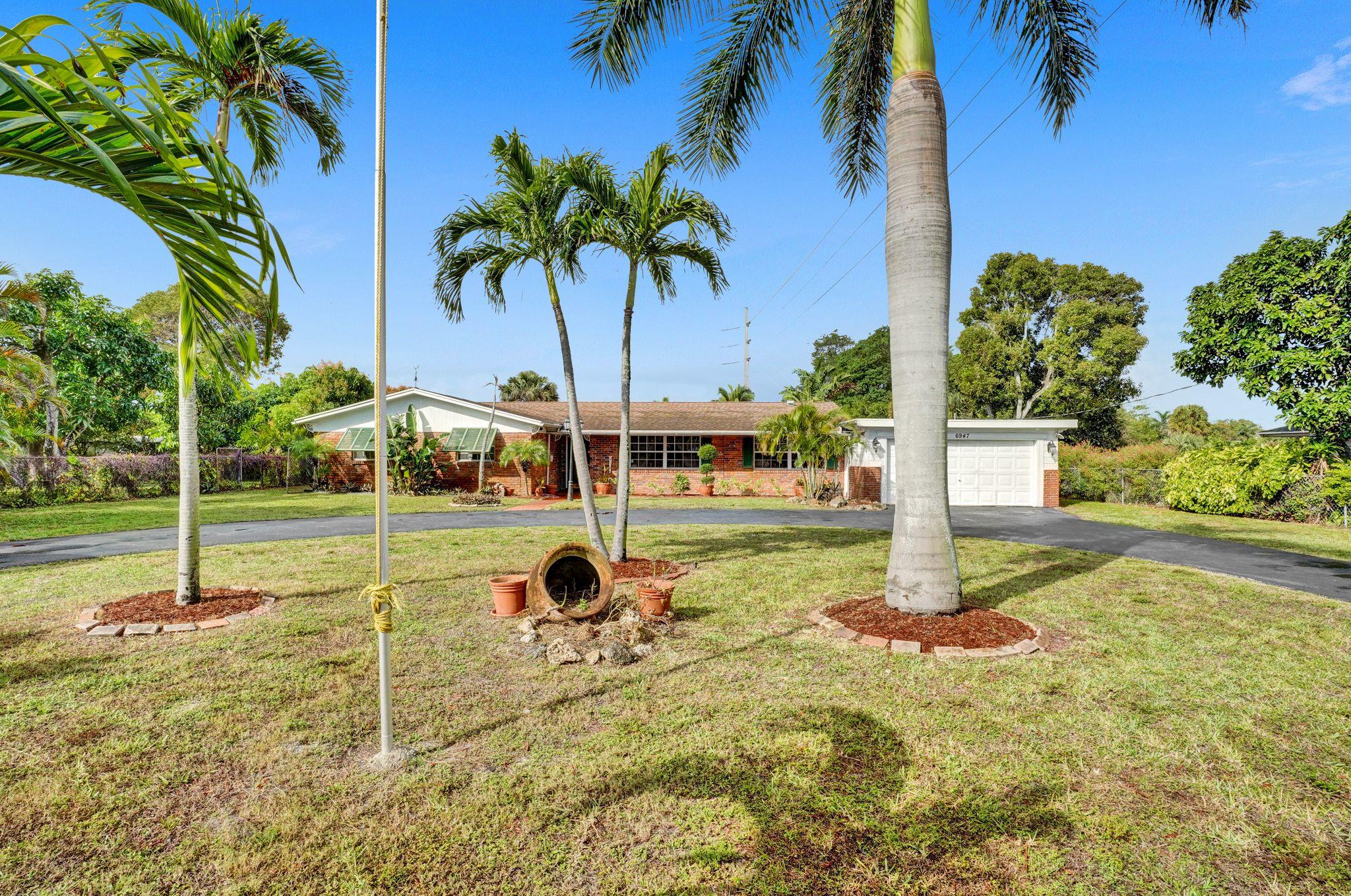 6947 High Ridge Road Lake Worth, FL 33462 - Photo 43 of 45 Welcome Home!