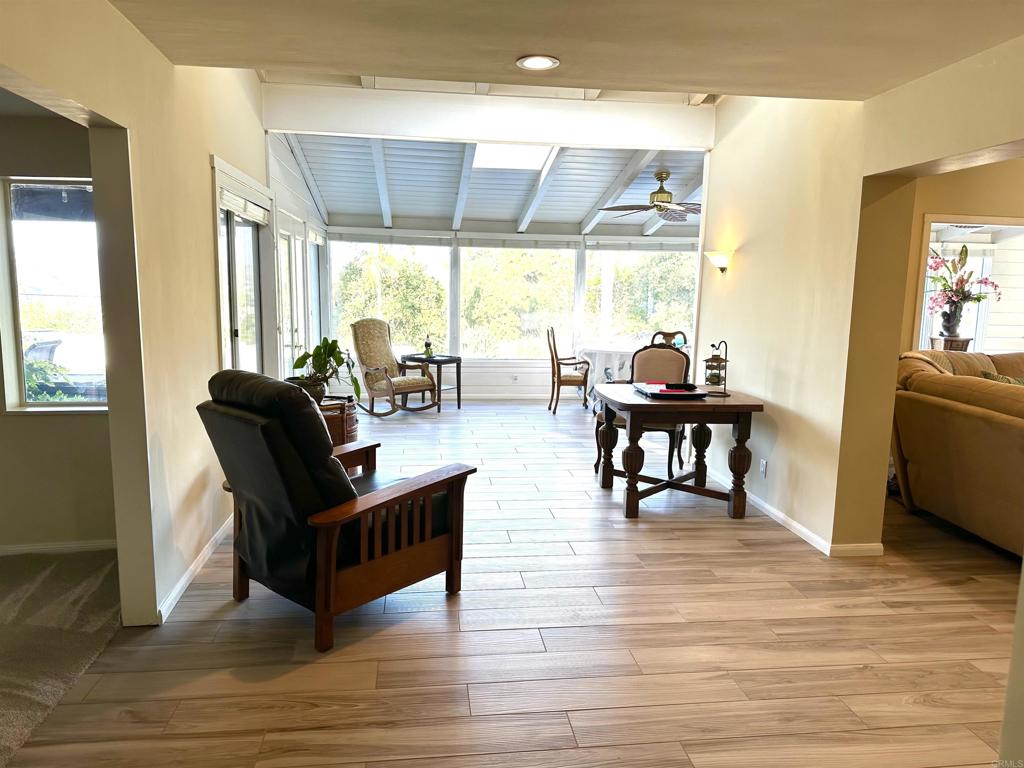 1001 Riverview Drive Fallbrook, CA 92028 - Photo 10 of 36 a living room with fireplace furniture and a large window