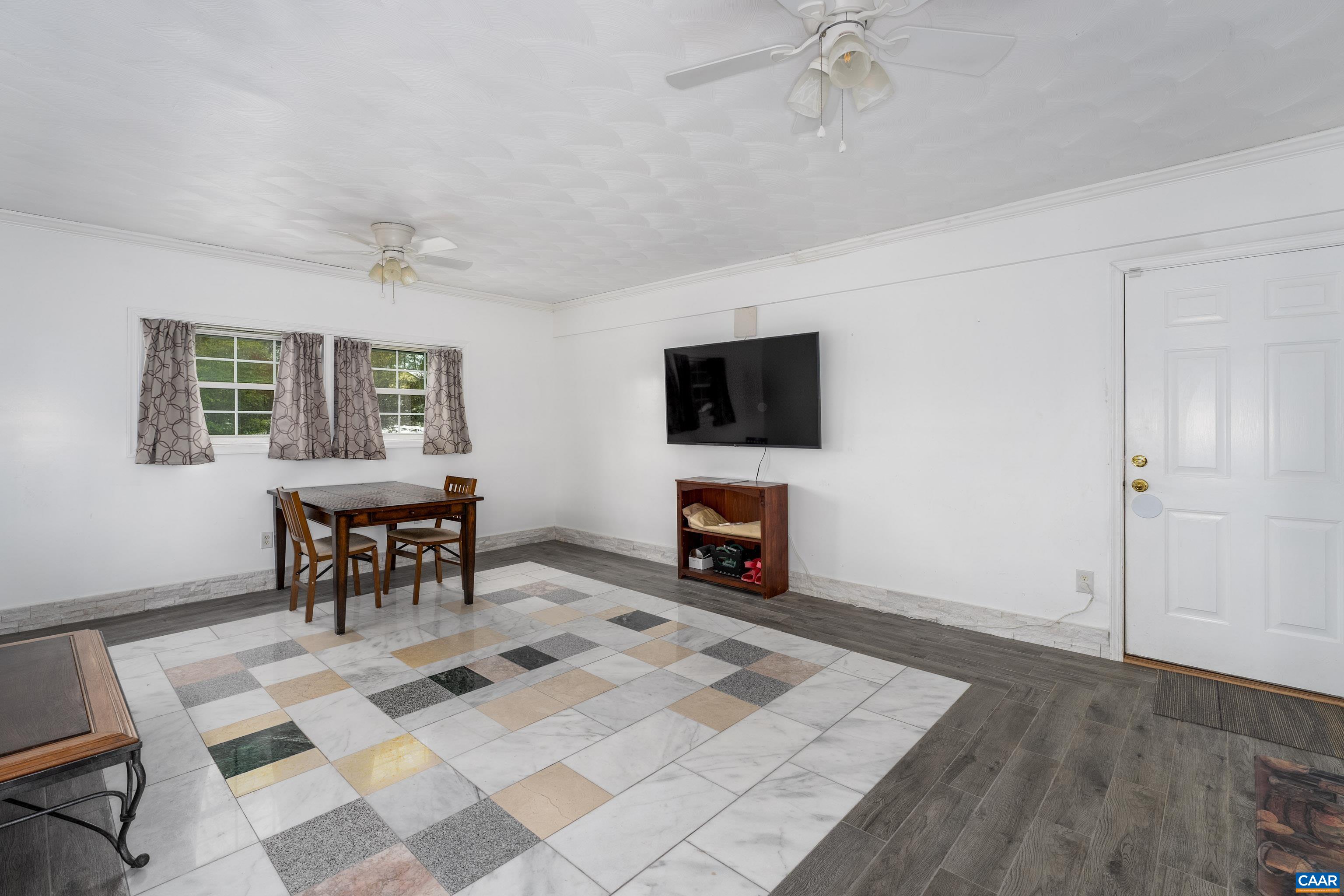 Outside access and inside access  gorgeous floors luxury tile .  Its huge room