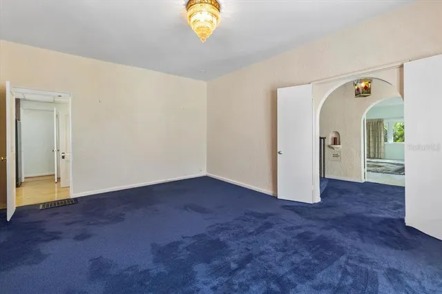 a kitchen with stainless steel appliances granite countertop a stove and a refrigerator