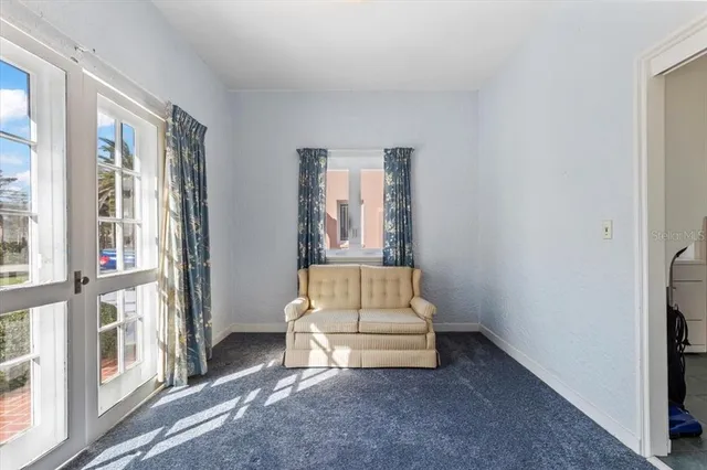 an empty room with closet area