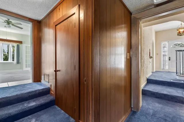 a living room with furniture and windows