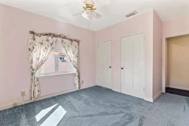 a view of a storage room with furniture