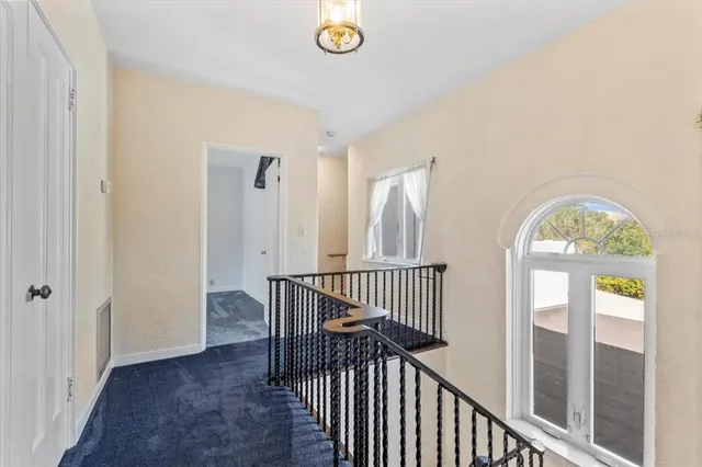 a view of a house with a small yard