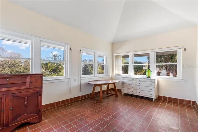 front view of a brick house with a windows