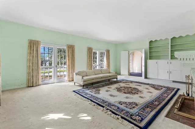 a bathroom with a toilet and a mirror