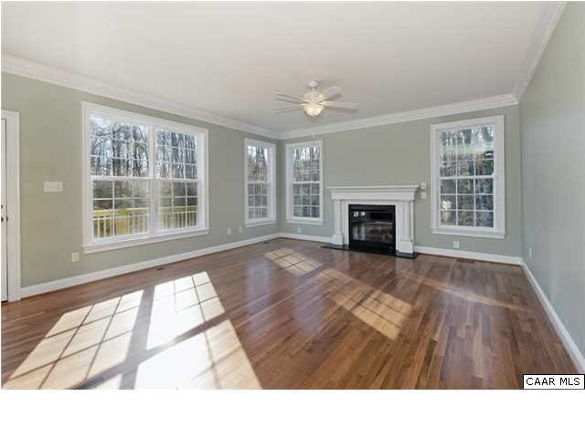 2416 Huntington Road Charlottesville, VA 22901 - Photo 6 of 24 a living room with furniture and a fireplace