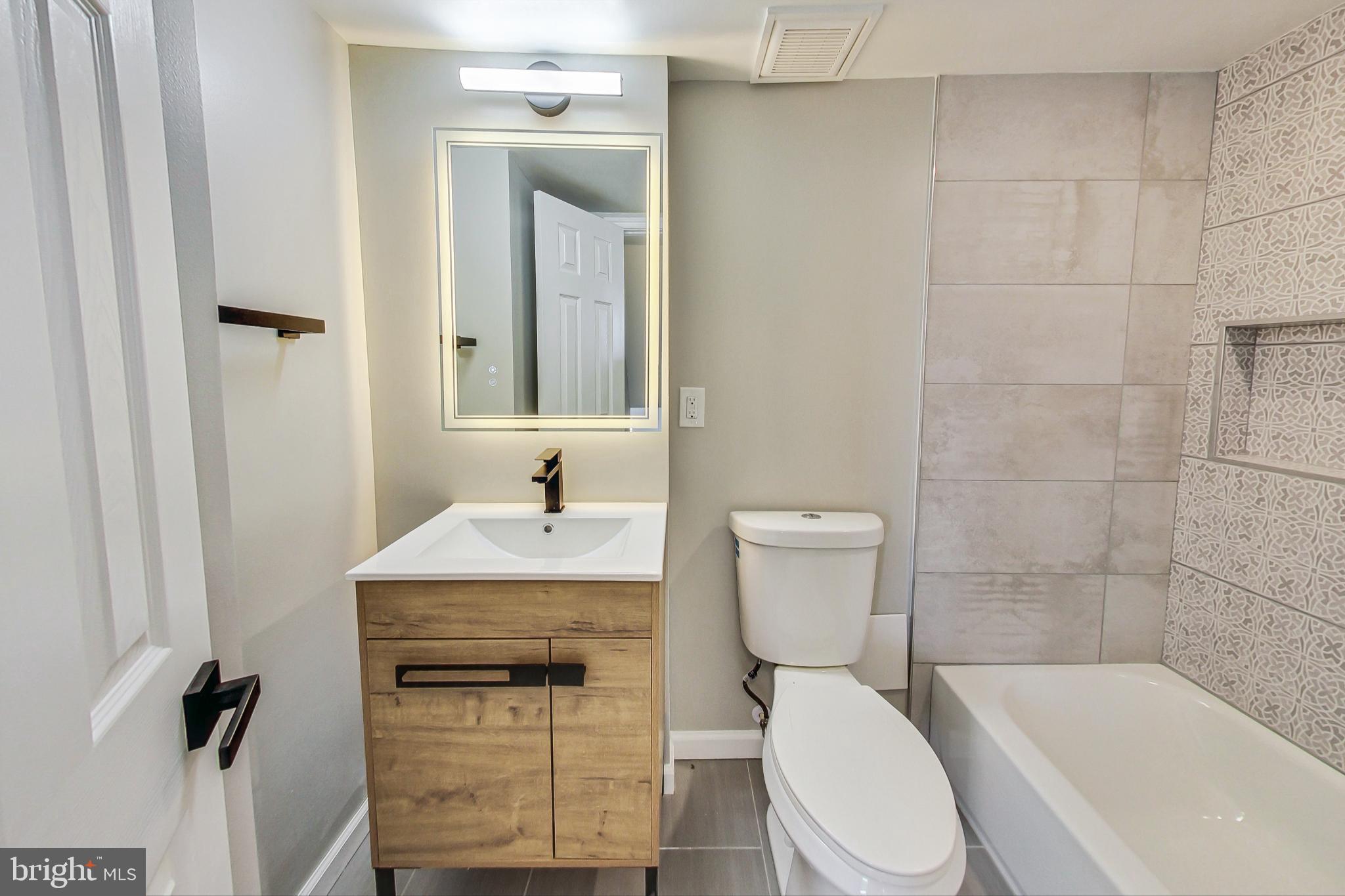 1823 Addison Road South District Heights, MD 20747 - Photo 21 of 35 Updated full bath