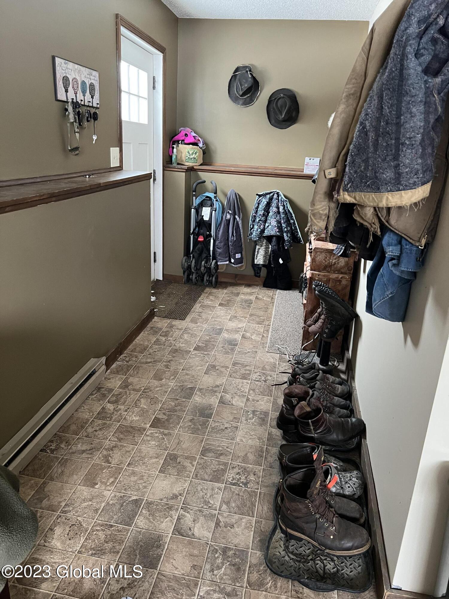 443 Snyder Road Cobleskill, NY 12043 - Photo 4 of 18 Mudroom entrance