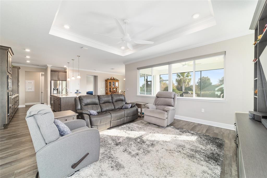 8457 Southwest 97th Circle Ocala, FL 34481 - Photo 17 of 62 a living room with furniture and a large window