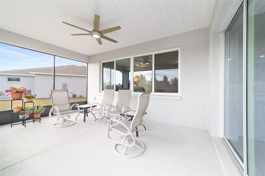 8457 Southwest 97th Circle Ocala, FL 34481 - Photo 56 of 62 a view of a dining room with furniture window and outside view