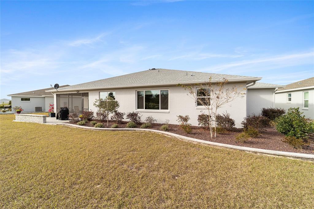 8457 Southwest 97th Circle Ocala, FL 34481 - Photo 60 of 62 a view of a house with a outdoor space
