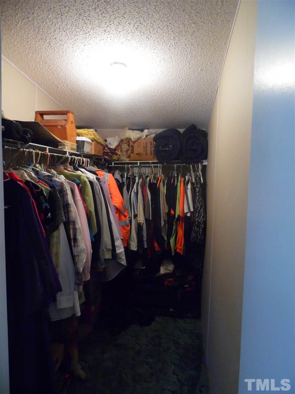 10582 Cone Road Middlesex, NC 27557 - Photo 17 of 25 a view of walk in closet
