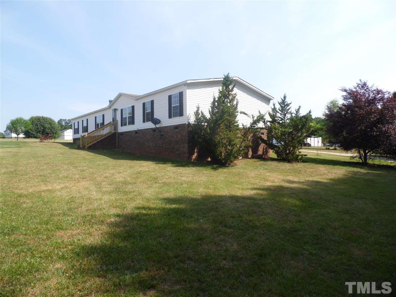 10582 Cone Road Middlesex, NC 27557 - Photo 22 of 25 a house view with garden space