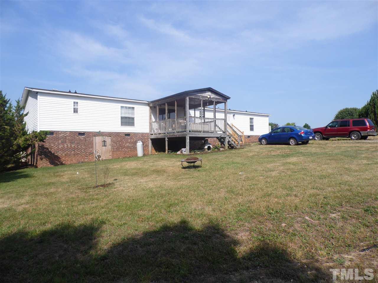 10582 Cone Road Middlesex, NC 27557 - Photo 23 of 25 a front view of a house with a yard