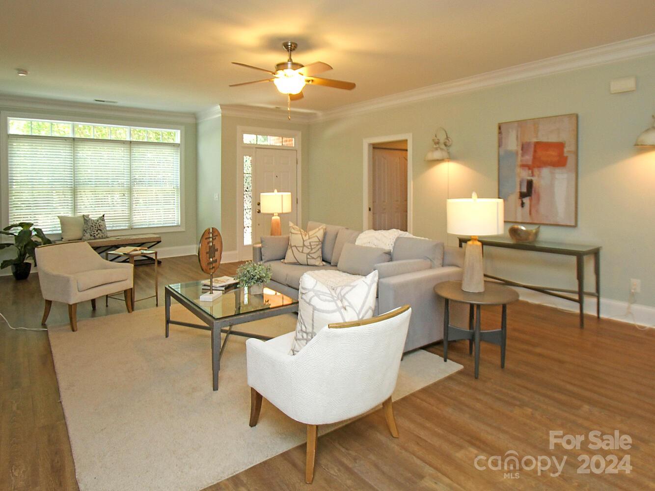 608 Crosswater Lane Fort Mill, SC 29708 - Photo 3 of 42 a living room with furniture and a wooden floor