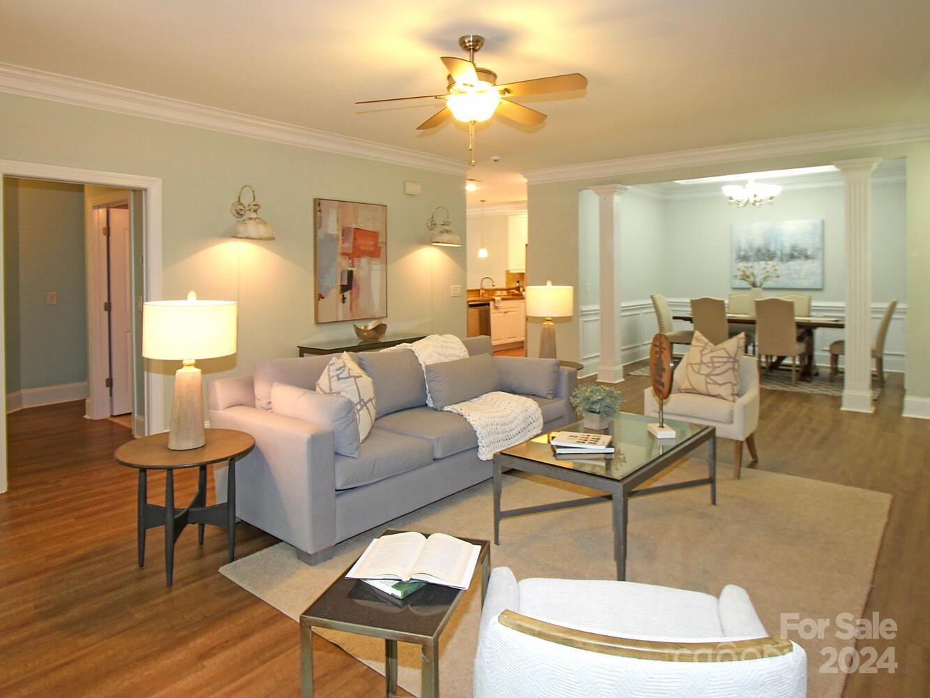 608 Crosswater Lane Fort Mill, SC 29708 - Photo 8 of 42 a living room with furniture and a lamp