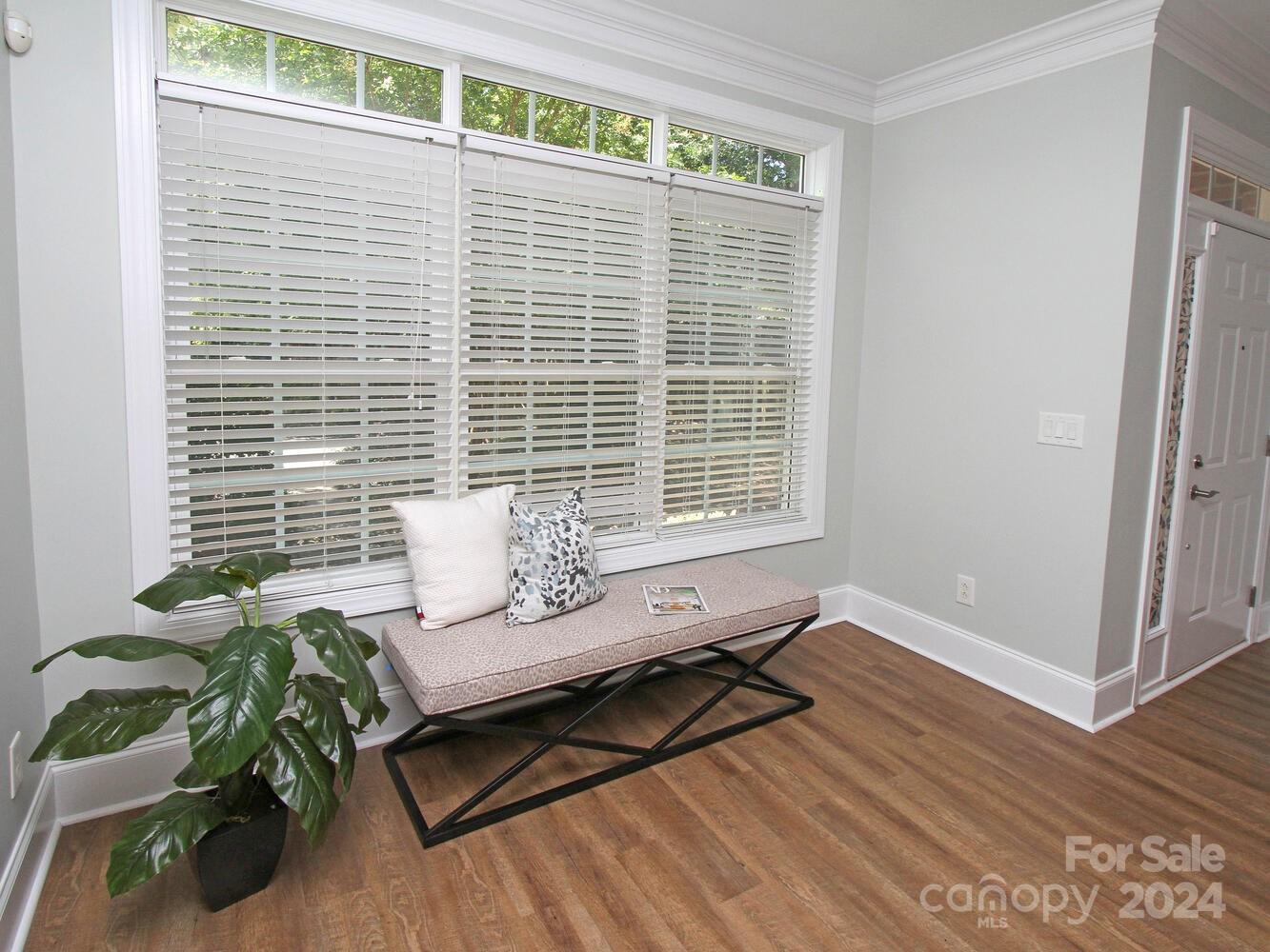 608 Crosswater Lane Fort Mill, SC 29708 - Photo 10 of 42 a view of a room with a window and wooden floor
